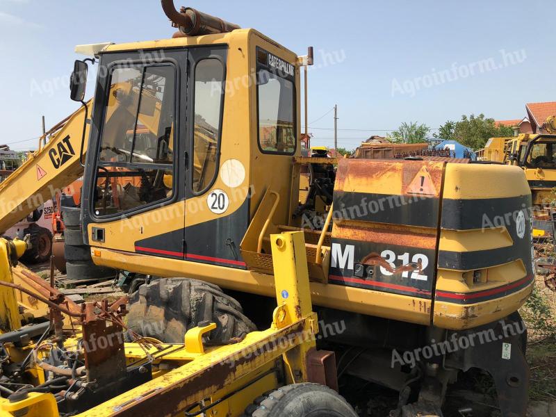 Caterpillar M312 gumikerekes kotro