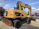 CAT Caterpillar M316D 17 t gumikerekes kotrógép klímával eladó