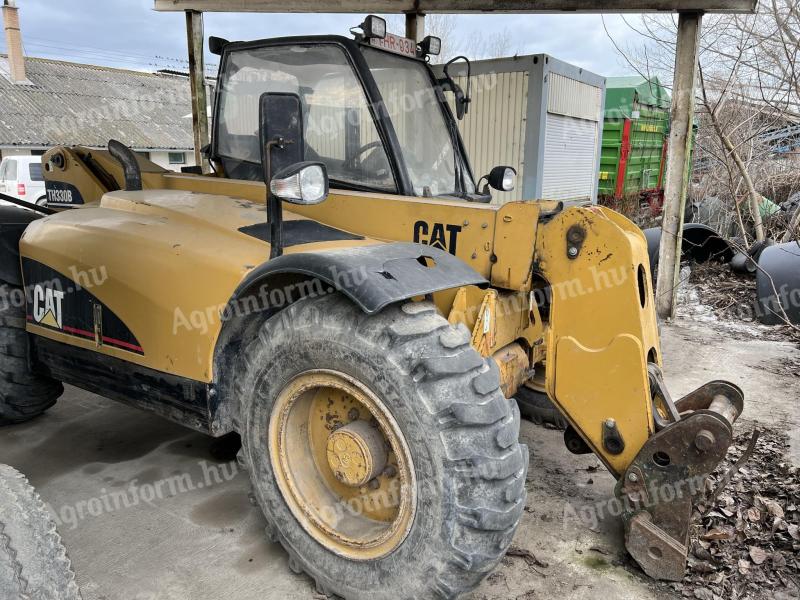 Caterpillar TH330B teleszkópos rakodó trágyarakó kanállal