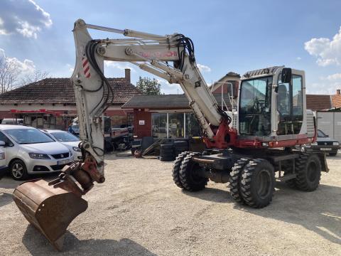 Takeuchi TB175W 8.5 t klímás gumikerekes kotrógép papírozható Takeuchi TB175W 8.5 t klímás gumikerekes kotrógép papírozható