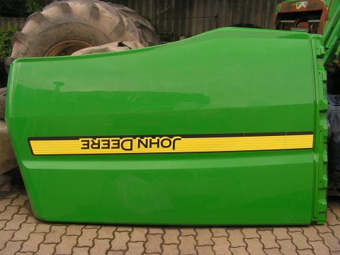John Deere T550,  T660,  W550,  W660 oldalburkolat AXE63302 John Deere T550,  T660,  W550,  W660 oldalburkolat AXE63302