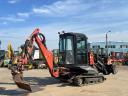 Ditch Witch XT1600 gumihevederes kotró-rakodó