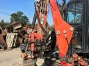 Ditch Witch XT1600 gumihevederes kotró-rakodó