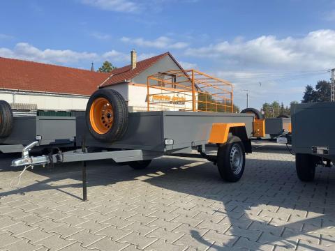 Új Orange utánfutó (150x300 cm) 750 KG fék nélküli,  1 tengelyes Új Orange utánfutó (150x300 cm) 750 KG fék nélküli,  1 tengelyes
