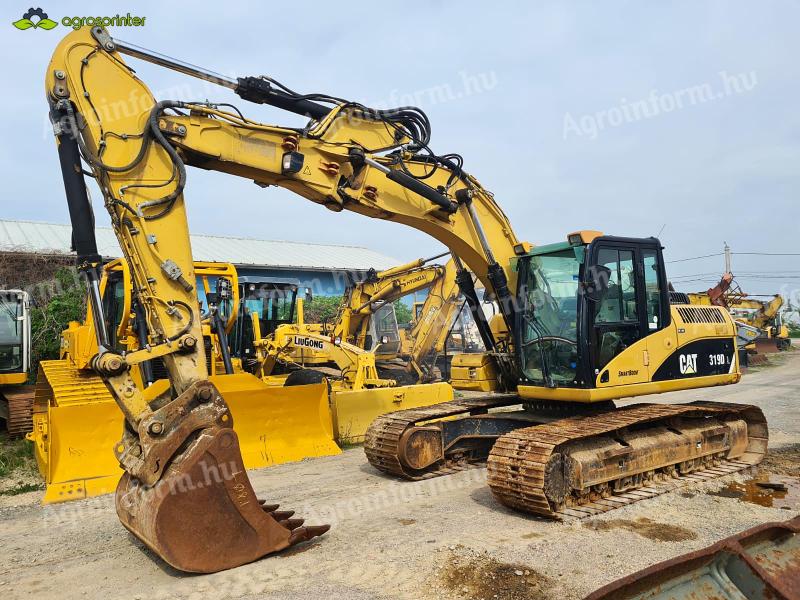 Caterpillar 319DL lánctalpas kotró