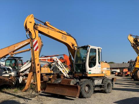 Liebherr A312 gumikerekes kotró Liebherr A312 gumikerekes kotró
