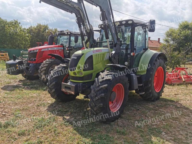 Claas Arion 640 CIS homlokrakodóval