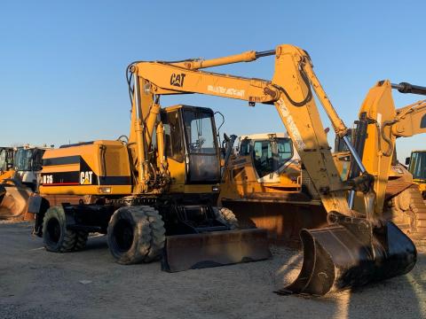 Caterpillar M315 gumikerekes kotró Caterpillar M315 gumikerekes kotró