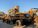 Caterpillar M315 gumikerekes kotró