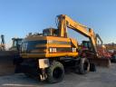 Caterpillar M315 gumikerekes kotró