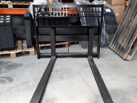 Bobcat 1CX,  CAT,  Gehl,  Komatsu csúszókormányzású védőkeretes raklapvilla Bobcat 1CX,  CAT,  Gehl,  Komatsu csúszókormányzású védőkeretes raklapvilla