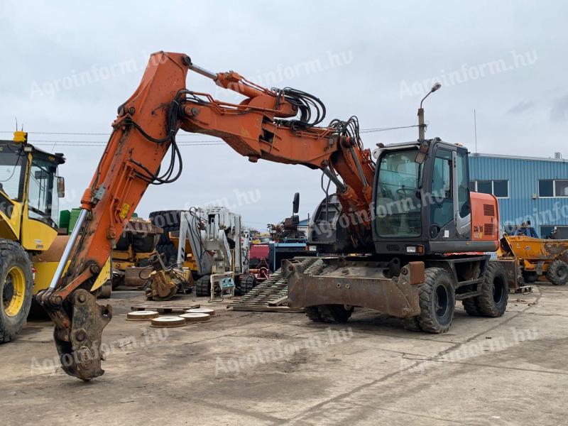 Hitachi ZX140W-3 gumikerekes kotró