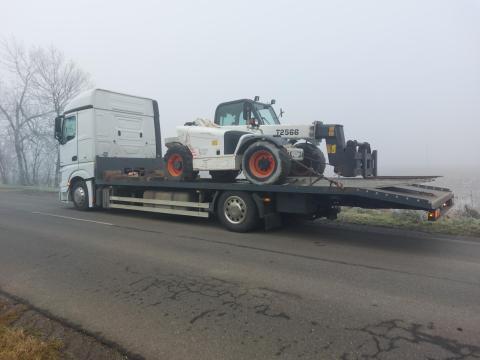 Kiskörös,  gépszállítás,  traktor,  pótkocsi,  mobilház,  túlméretes szállítás országosan Kiskörös,  gépszállítás,  traktor,  pótkocsi,  mobilház,  túlméretes szállítás országosan