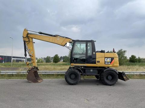 Caterpillar M313D gumikerekes kotrógép / 2016 / 9 937 üzemóra / Lízing 20%-tól Caterpillar M313D gumikerekes kotrógép / 2016 / 9 937 üzemóra / Lízing 20%-tól