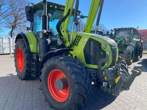 Claas Arion 650 CIS gyári homlokrakodóval, fronthidraulikával és front TLT-vel Claas Arion 650 CIS gyári homlokrakodóval, fronthidraulikával és front TLT-vel