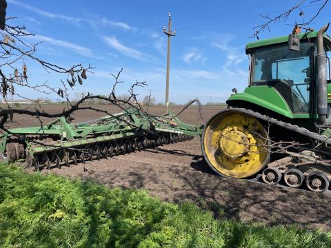 John Deere 8410T hevederes traktor