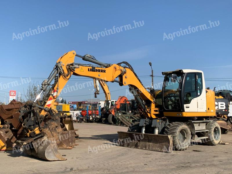 Liebherr A912 Compact + Engcon Rototilt gumikerekes kotró