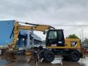 Caterpillar M313D gumikerekes kotró