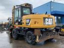 Caterpillar M313D gumikerekes kotró