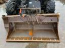 Caterpillar M313D gumikerekes kotró