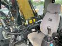 Caterpillar M313D gumikerekes kotró