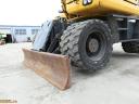 Komatsu PW148-10 gumikerekes kotrógép