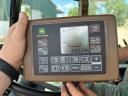 John Deere 854 MaxiCut bálázó