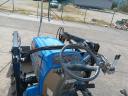 Iseki TF223 összkerékhajtású,  szervokormányos,  háromhengeres 22 LE traktor homlokrakodóval