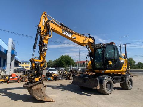 JCB JS145W Rototilt Engcon és Leica Icon 2D Lézer rendszerrel, gumikerekes kotró