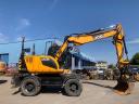 JCB JS145W Rototilt Engcon és Leica Icon 2D Lézer rendszerrel, gumikerekes kotró
