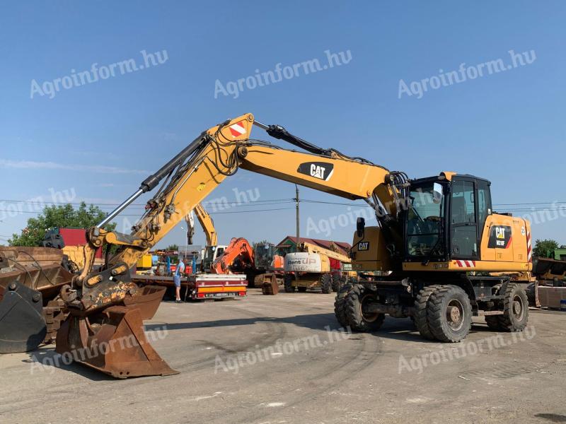 Caterpillar M318F gumikerekes kotró