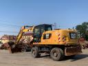 Caterpillar M318F gumikerekes kotró