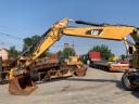Caterpillar M318F gumikerekes kotró