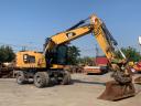 Caterpillar M318F gumikerekes kotró
