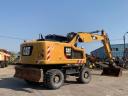 Caterpillar M318F gumikerekes kotró