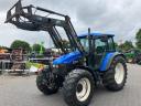 New Holland TS 115 homlokrakodóval