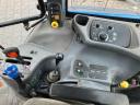 New Holland TS 115 homlokrakodóval