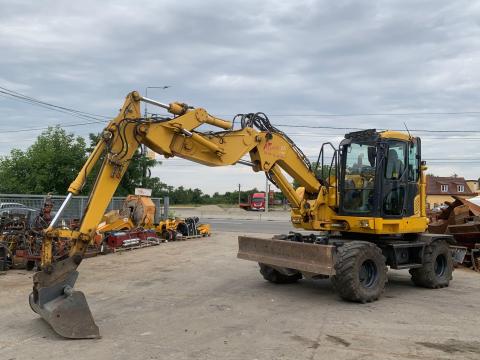 Komatsu PW118MR-11 gumikerekes kotró Komatsu PW118MR-11 gumikerekes kotró
