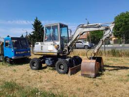 Komatsu PW30-1 gumikerekes kotró minikotró