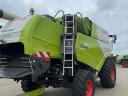 CLAAS TUCANO 450 APS kombájn vágóasztallal és szállítókocsival