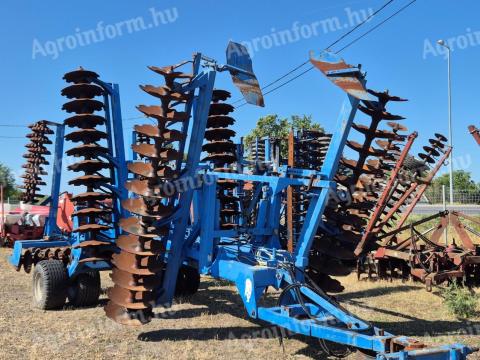 Rabewerk 6 m-es nehéztárcsa hengerrel szerelve eladó Rabewerk 6 m-es nehéztárcsa hengerrel szerelve eladó