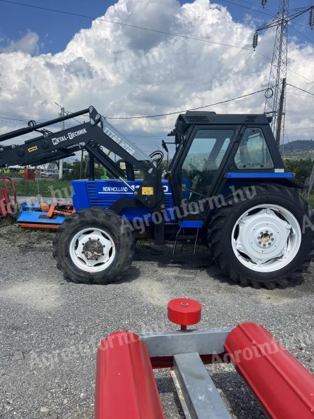 Fiat New Holland 110-90 homlokrakodóval, jó állapotban