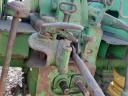 John Deere 710 traktor homlokrakodóval eladó