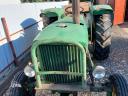 John Deere 710 traktor homlokrakodóval eladó