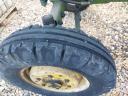 John Deere 710 traktor homlokrakodóval eladó