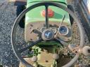 John Deere 710 traktor homlokrakodóval eladó