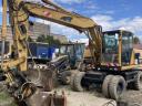 CAT M312 gumikerekes kotró eladó