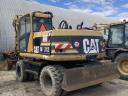 CAT M312 gumikerekes kotró eladó