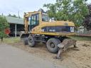 CAT M316C gumikerekes kotró eladó