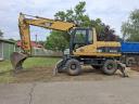 CAT M316C gumikerekes kotró eladó